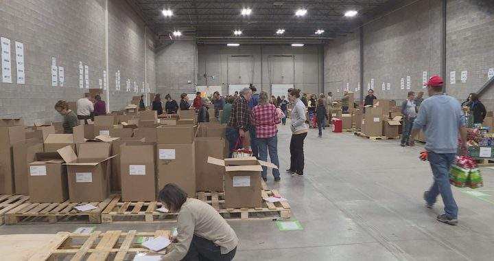 Volunteers sorted Christmas gifts for 5,100 isolated Calgary seniors on Dec. 1.