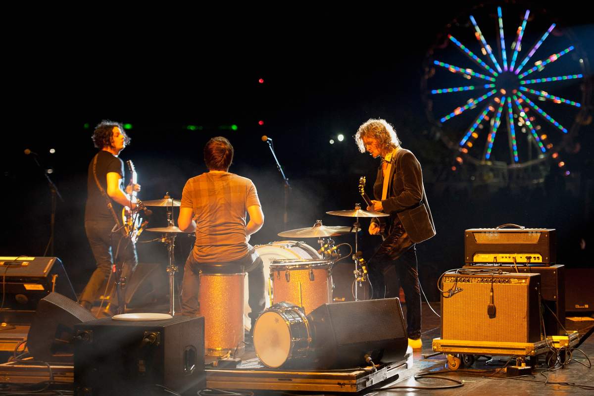 (L-R): Jack White, Patrick Keeler and Brendan Benson of The Raconteurs perform during the 2011 Voodoo Experience at City Park on Oct. 30, 2011, in New Orleans, La.