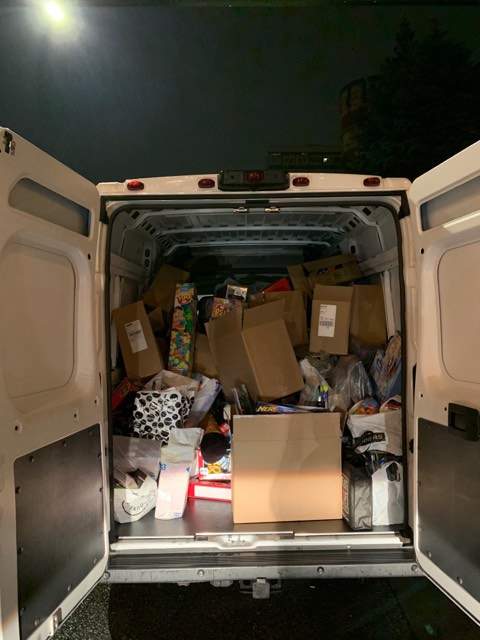 One of two vans being filled with toys for The Salvation Army’s Christmas Hamper Program.
