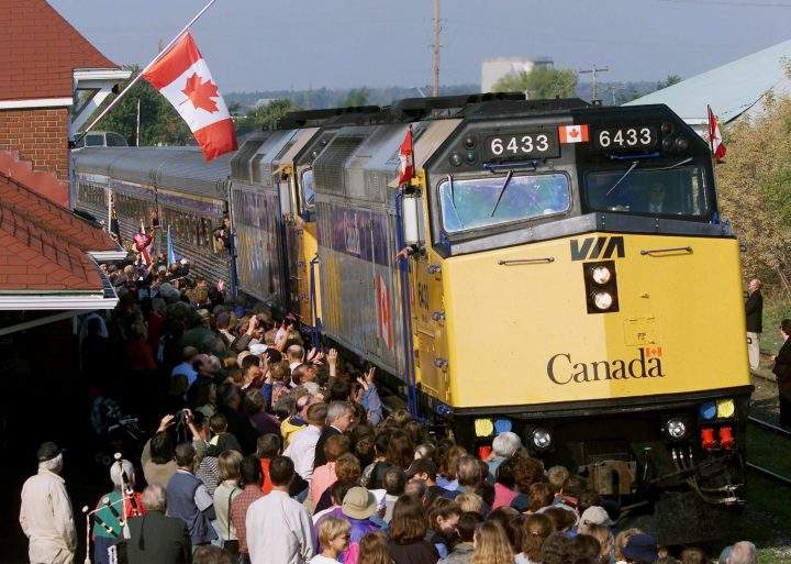 The train carrying the casket of the late prime minister Pierre Trudeau is greeted by hundreds of mourners as it passes through Alexandria, Ont., on Oct. 2, 2000.