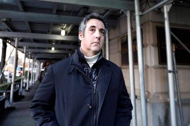 Michael Cohen, former lawyer to President Donald Trump, leaves his apartment building in New York.