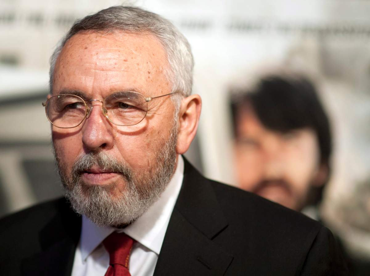 Antonio "Tony" Mendez, former CIA technical operations officer, poses for photographers at the premiere of the film Argo in Washington, Wednesday, Oct. 10, 2012.