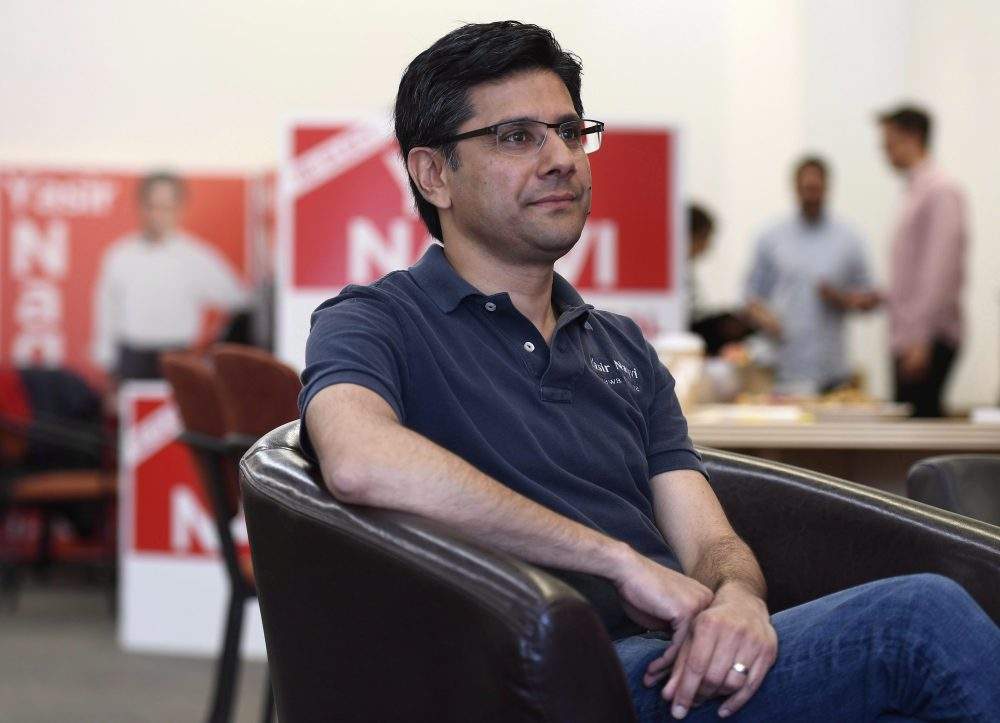 Yasir Naqvi is photographed in his provincial campaign office in Ottawa on Thursday, May 24, 2018. Naqvi, who was defeated in the 2018 Ontario election, will run for the federal seat in the next election under the Liberal banner.