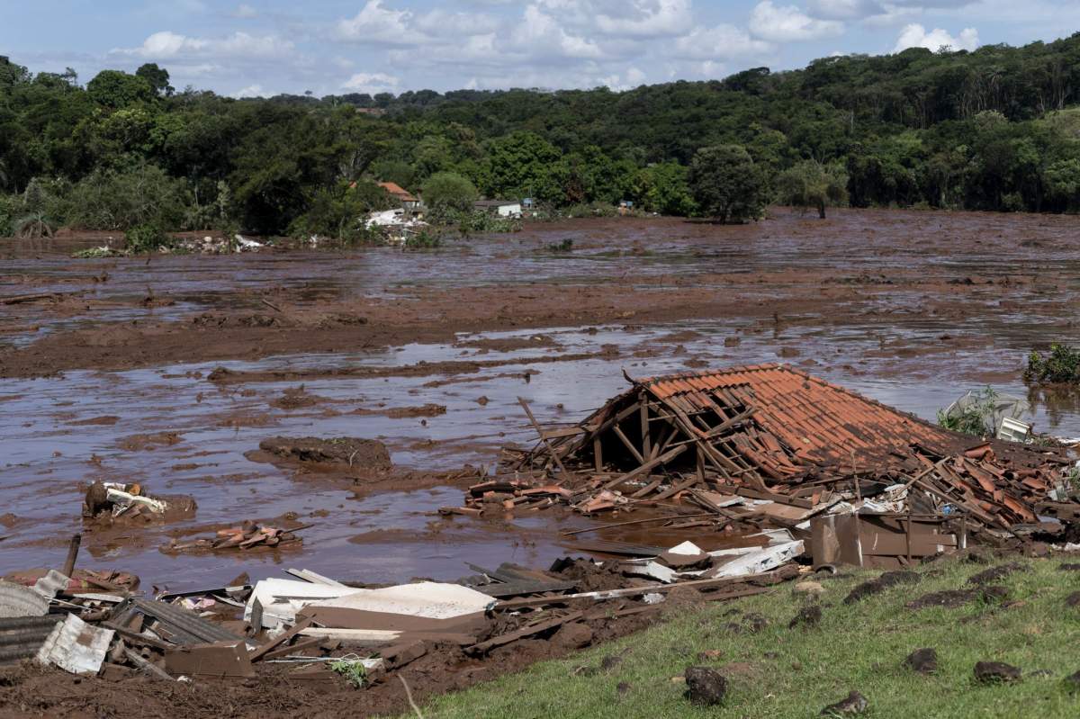A structure lays in ruins after a dam collapsed near Brumadinho, Brazil, Friday, Jan. 25, 2019. Brazilian mining company Vale SA said it didn’t yet have information on deaths or injuries at the dam but said that tailings have reached the community of Vila Ferteco.
