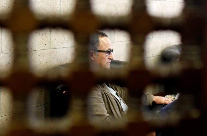 Retired Dutch General Patrick Cammaert, who heads a United Nations advance team tasked with monitoring a ceasefire between the Iranian-aligned Houthi group and Saudi-backed government forces in Yemen's Hodeidah, sits with Houthi officials upon his arrival at Sanaa airport, Yemen, Dec. 23, 2018. 