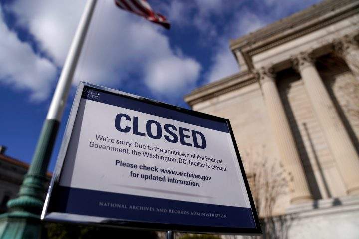 A sign declares the National Archives is closed due to a partial federal government shutdown in Washington, U.S., Dec. 22, 2018.