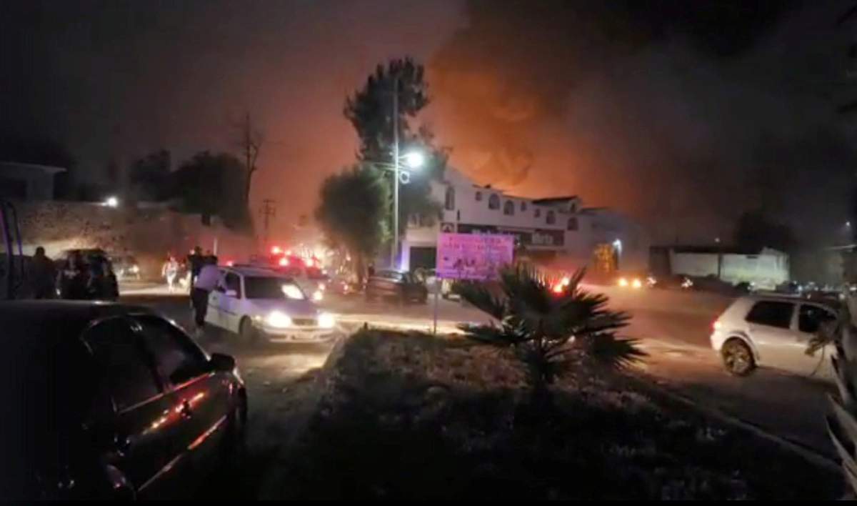People react at the scene where a ruptured fuel pipeline exploded, in the municipality of Tlahuelilpan, Hidalgo, Mexico, near the Tula refinery of state oil firm Petroleos Mexicanos (Pemex), January 18, 2019 in this still image taken from a video obtained from social media.