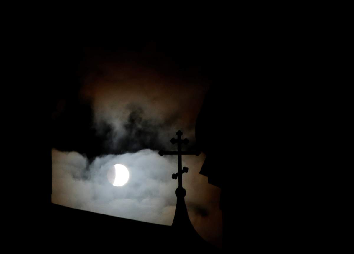The “super blood wolf moon” is seen during a lunar eclipse in the village of Turets, Belarus, on Jan. 21, 2019.