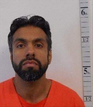 Officers are searching for 32-year-old Jasjit Dhaliwal on suspicion that he breached his statutory release.