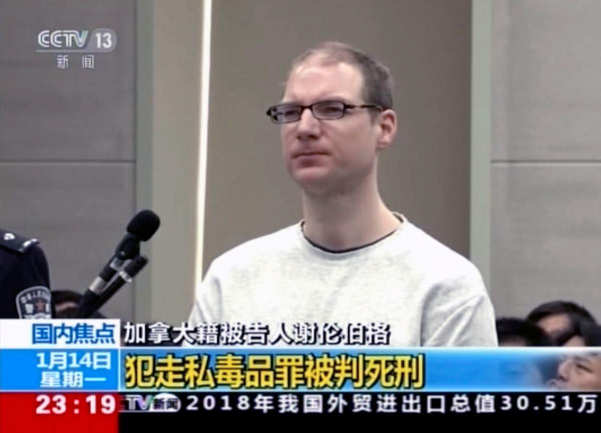 In this image taken from a video footage run by China’s CCTV, Canadian Robert Lloyd Schellenberg attends his retrial at the Dalian Intermediate People’s Court in Dalian, northeastern China’s Liaoning province on Monday, Jan. 14, 2019. A Chinese court sentenced the Canadian man to death Monday in a sudden retrial in a drug smuggling case that is likely to escalate tensions between the countries over the arrest of a top Chinese technology executive.