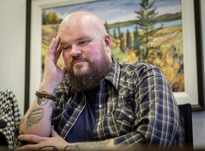 Former Syncrude firefighter Michael Swan talks about his situation in Calgary, Alta., Monday, Jan. 14, 2019. A lawsuit filed by a former firefighter and paramedic against Syncrude Canada claims the oilsands giant wrongfully denied him benefits and fired him after he was diagnosed with post-traumatic stress disorder related to his job.