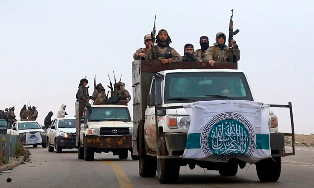 The Hayat Tahrir al-Sham flag on vehicles in this photo released Dec. 4, 2018 by the Al Qaeda-affiliated Ibaa News Agency.