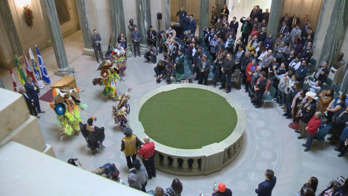 Dancers perform as part of the grand entry at the ’60s Scoop apology