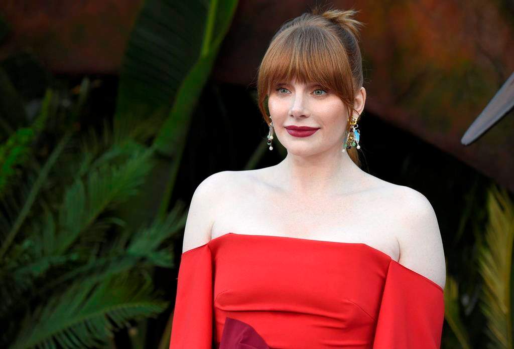 FILE -- In this Tuesday, June 12, 2018 file photo actor Bryce Dallas Howard arrives at the Los Angeles premiere of "Jurassic World: Fallen Kingdom" at the Walt Disney Concert Hall. Howard, an actor, producer and director, has been named 2019 Woman of the Year by Harvard University's Hasty Pudding Theatricals student group.