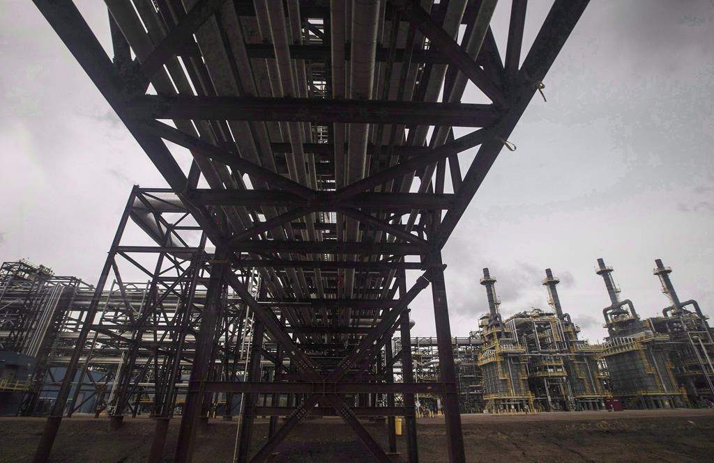 Pipes lead to a processing unit at Suncor Fort Hills facility in Fort McMurray Alta., on September 10, 2018. Suncor Energy Inc. says its upstream production in the last three months of 2018 hit a quarterly record. THE CANADIAN PRESS/Jason Franson.