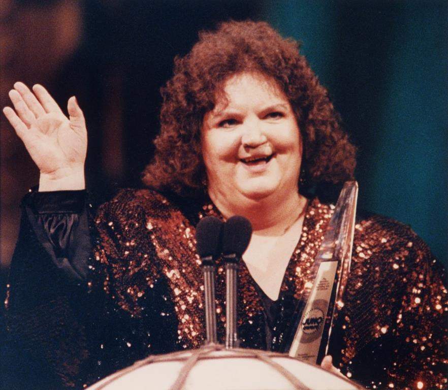 Rita MacNeil waves to the audience as she accepts her Juno Award for Female Vocalist of the Year in Toronto, March 18, 1990. Rita's Tea Room, the small-town attraction that once drew tens of thousands of visitors a year on the star power of singer Rita MacNeil, is closing six years after her death.