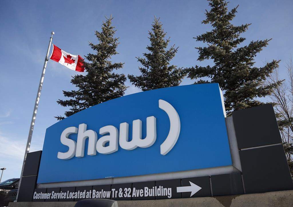 A Shaw Communications sign is shown at the company's headquarters in Calgary, Wednesday, Jan. 14, 2015. Shaw Communications Inc. beat analyst estimates with a 68.5 per cent increase in its first-quarter net income as growth at Freedom Mobile and its business services unit offset flat results at its core residential services. THE CANADIAN PRESS/Jeff McIntosh.