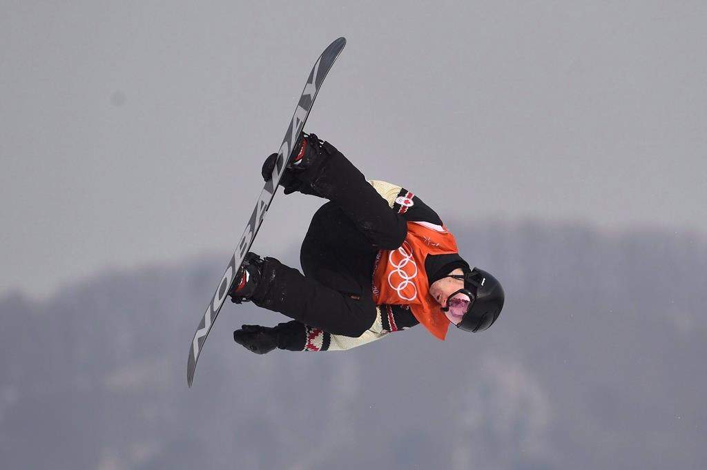 Canada's Max Parrot of Bromont, Que. flies through the air during his second run in the men's snowboard slopestyle qualification at the Phoenix Snow Park at the 2018 Winter Olympic Games in Pyeongchang, South Korea on February 10, 2018.