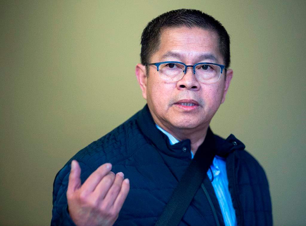 Hector Mantolino, charged with not paying Filipino temporary workers their required wages, arrives at Nova Scotia Supreme Court at his sentencing in Halifax on Friday, Jan. 4, 2019.
