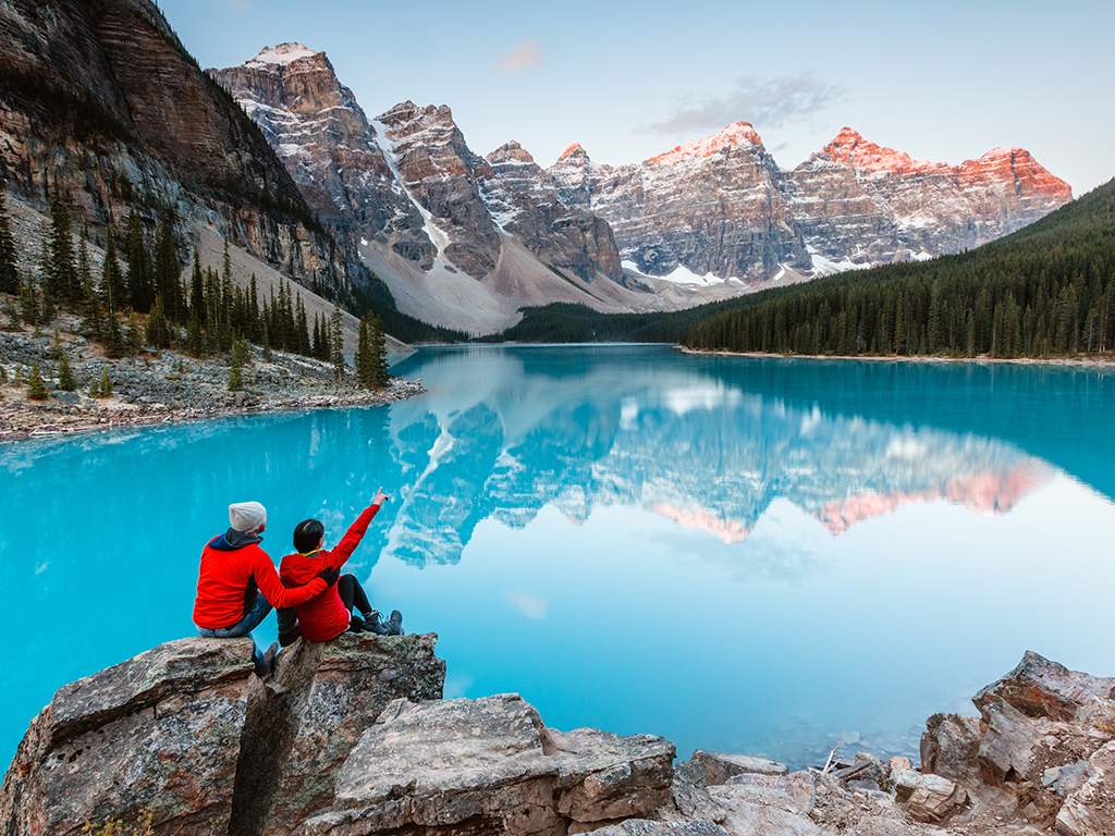 Couple at Moraine lake, Banff National Park, Alberta, Canada.