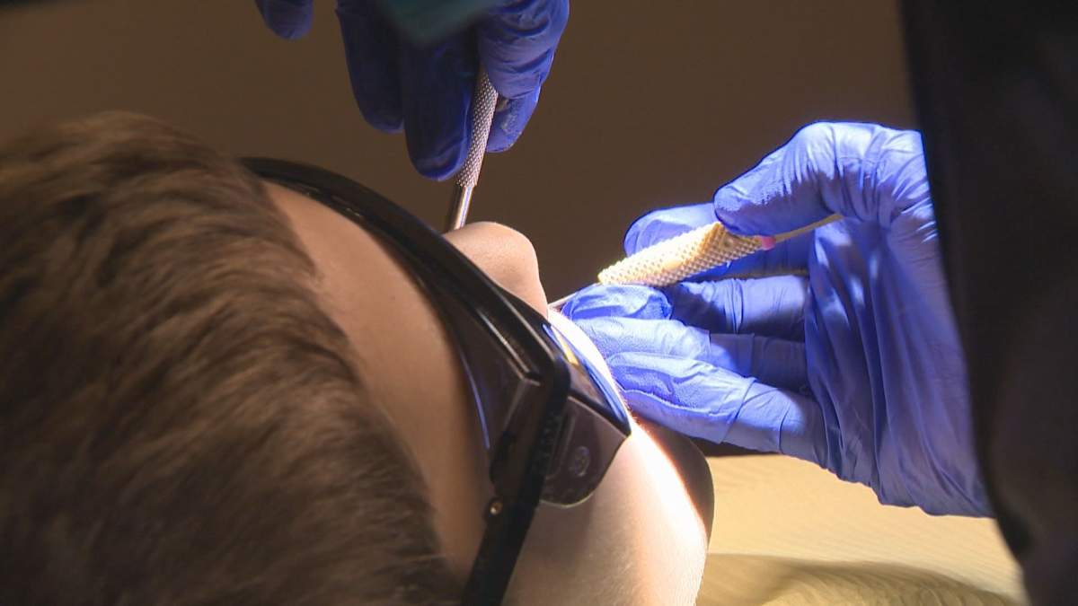 Child receives dental care.