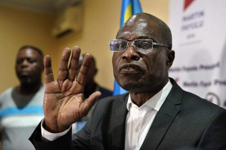 Opposition candidate Martin Fayulu speaks to the press at his headquarters in Kinshasa, Congo, Thursday Jan. 10, 2019.