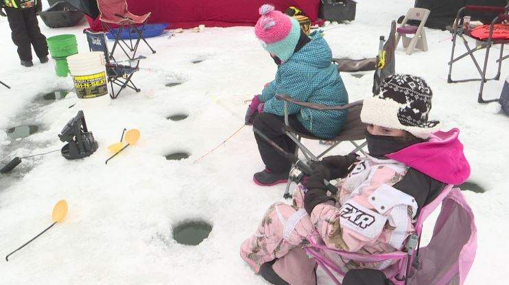Two of hundreds of participants in Sunday\’s Kid Fish Derby north of Selkirk, Man.