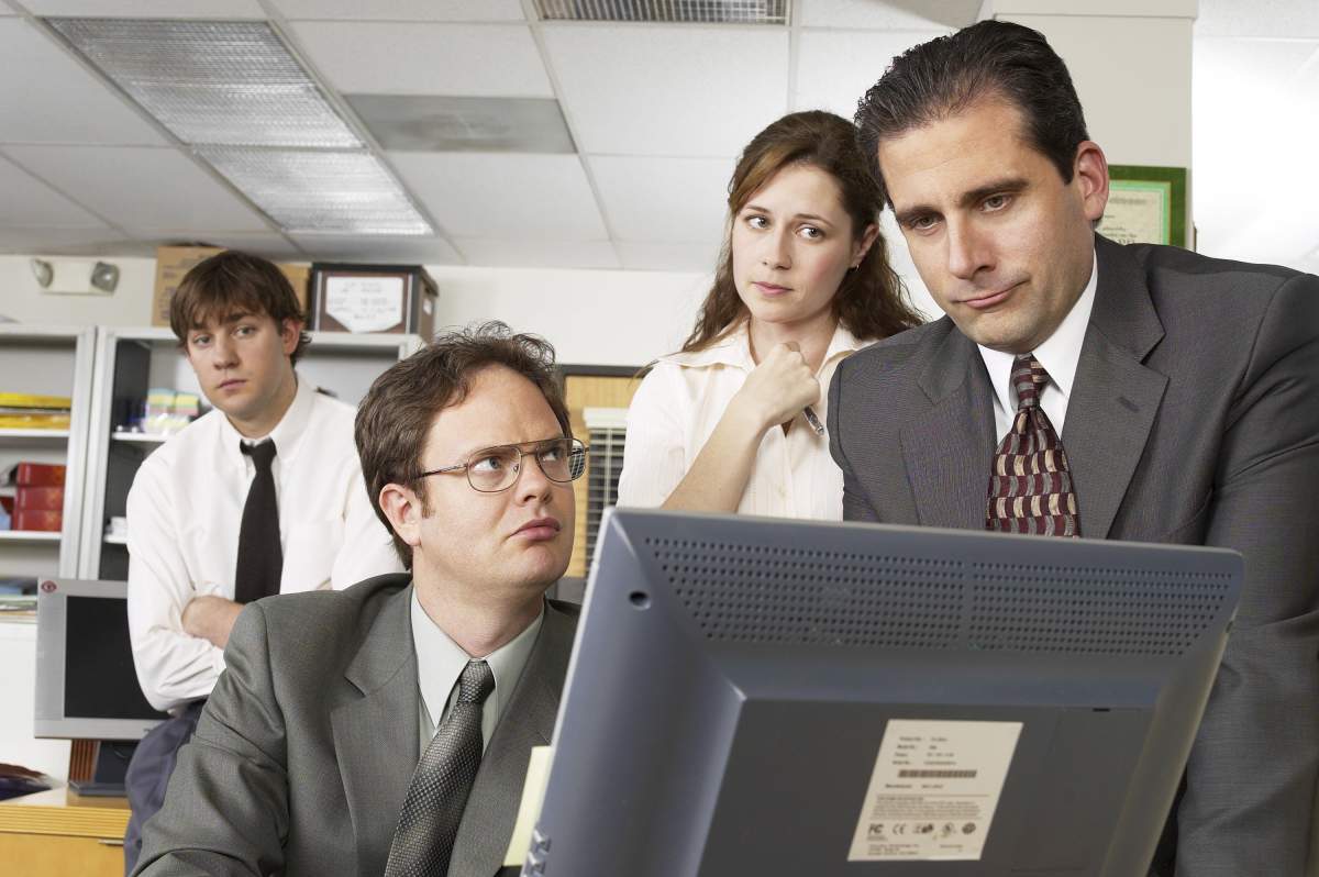 John Krasinski as Jim Halpert, Rainn Wilson as Dwight Schrute, Jenna Fischer as Pam Beesly, and Steve Carell as Michael Scott– Photo by: Chris Haston/NBCU Photo Bank
