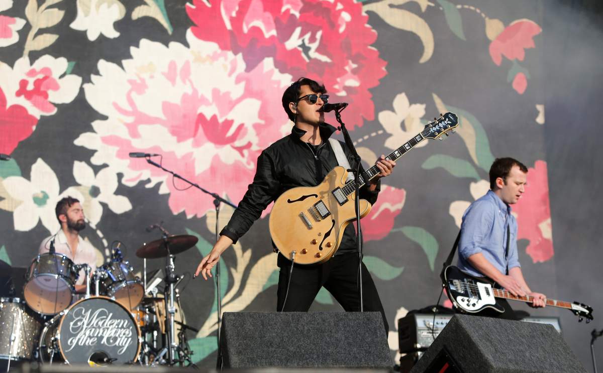 Chris Tomson, Ezra Koenig and Chris Baio of Vampire Weekend perform at Reading Festival on Aug. 22, 2014, in Reading, England.
