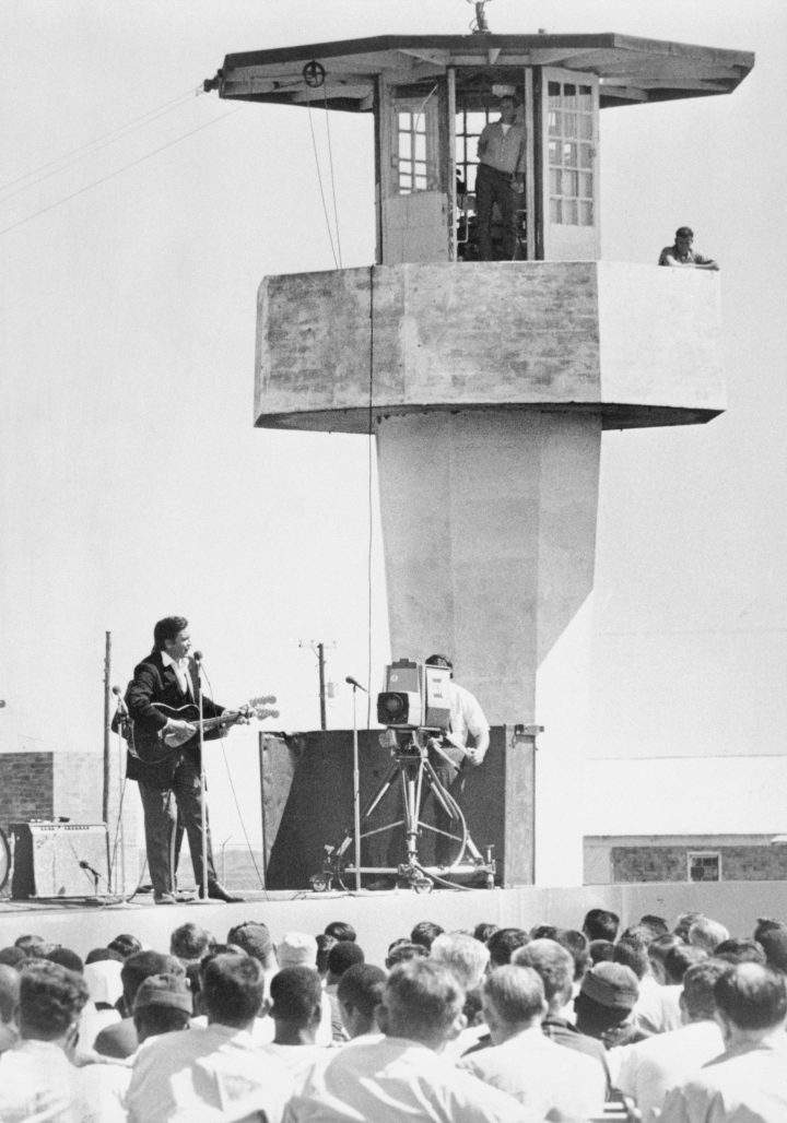 Johnny Cash puts on a show for about 800 inmates at Arkansas’ Cummins Prison Farm in 1969.