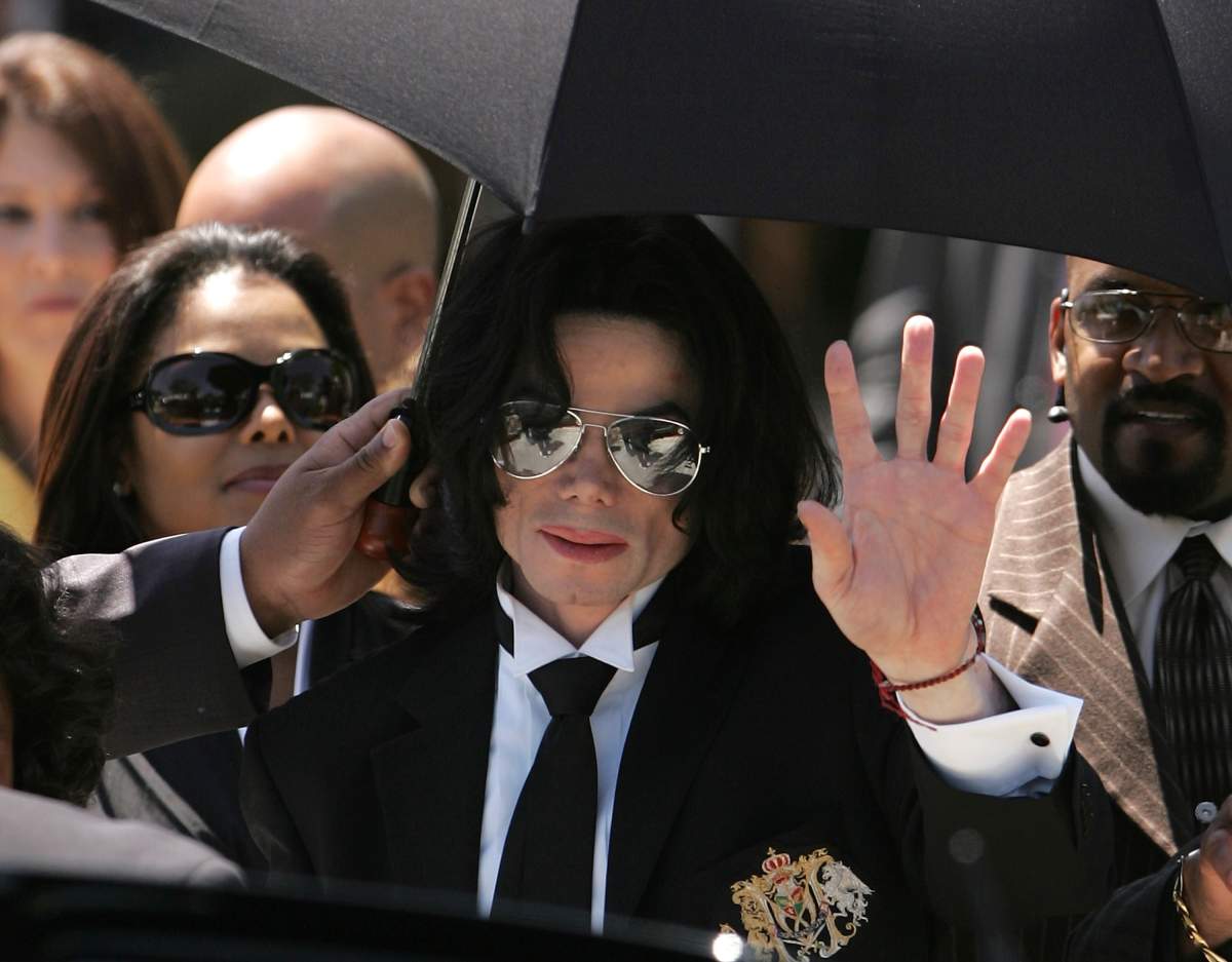 Michael Jackson waves to fans after he is found not guilty on all counts in his child molestation trial at the Santa Barbara County Courthouse June 13, 2005 in Santa Maria, Calif.