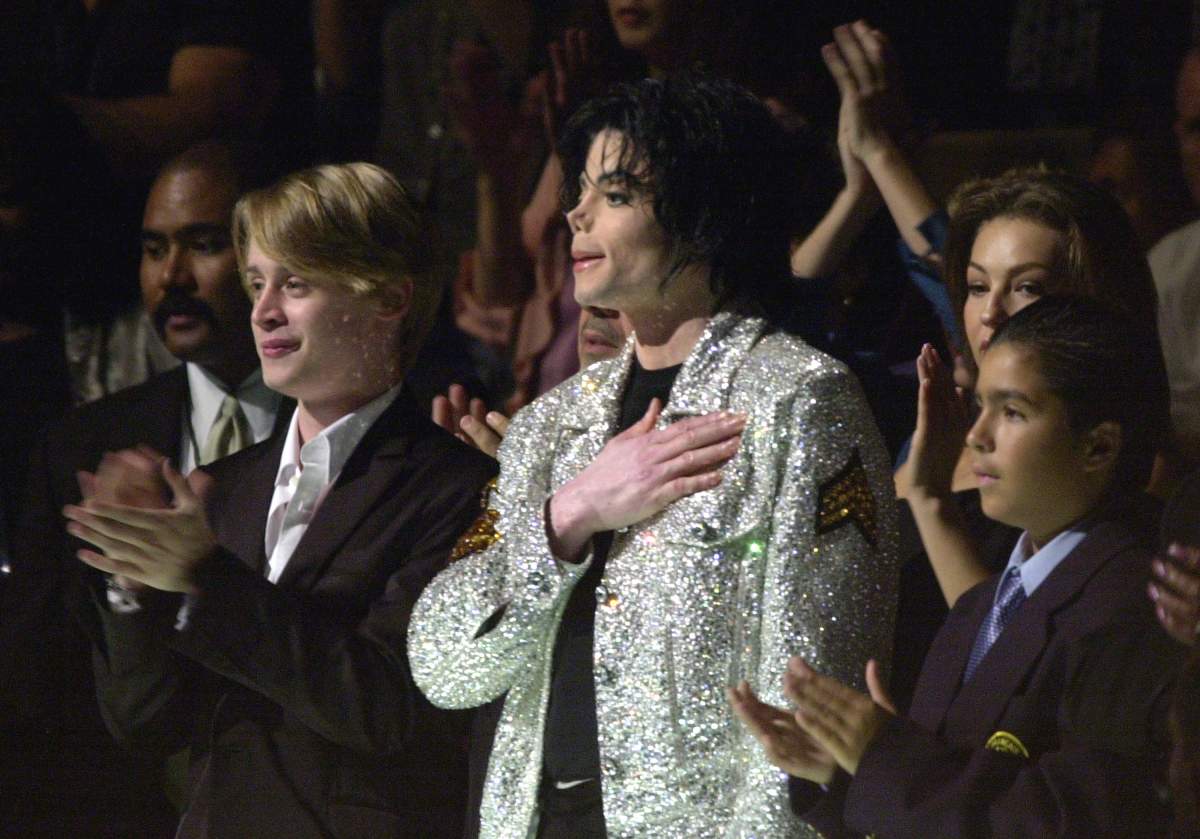 Michael Jackson and Macaulay Culkin at Madison Square Garden in New York City. (Photo by Kevin Kane/WireImage)