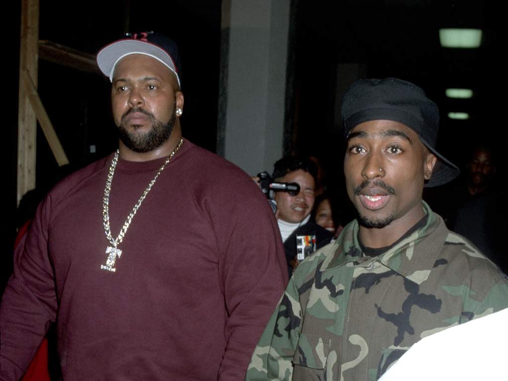 FILE - Marion "Suge" Knight and Tupac Shakur.