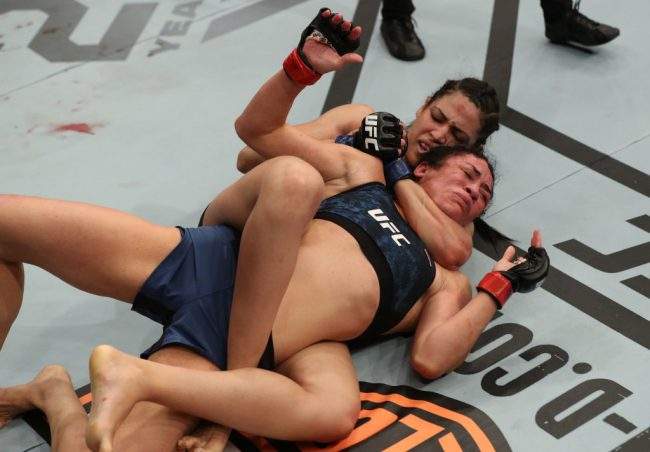 Polyana Viana uses a rear-naked choke to submit Maia Stevenson in her UFC debut at the Mangueirinho Arena in Belem, Brazil, Feb. 3, 2018.