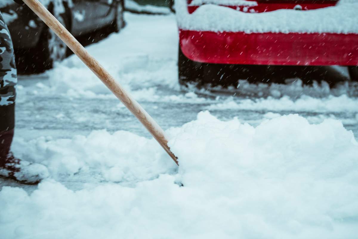 shovel snow red car winter