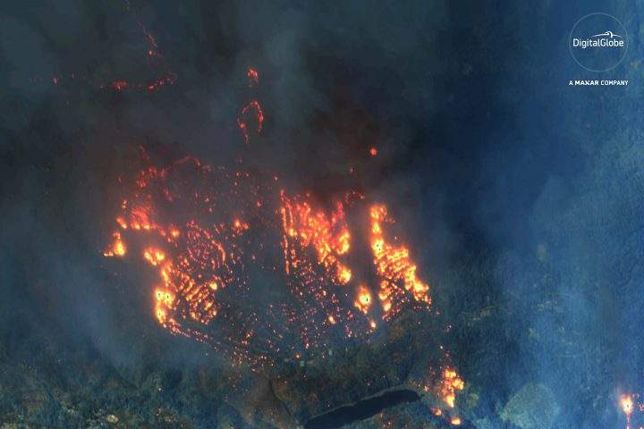 This Nov. 9, 2018 satellite image provided by DigitalGlobe shows fires consuming Paradise, Calif.