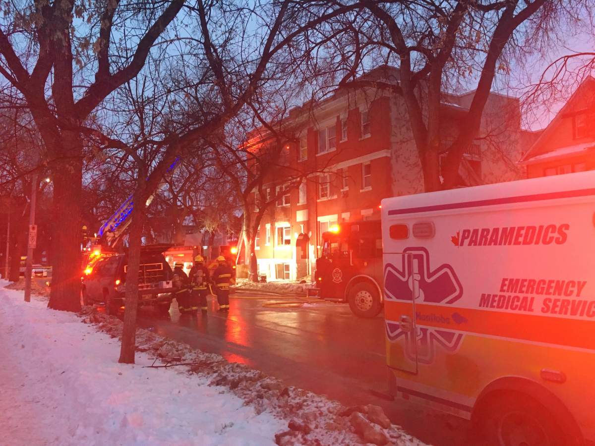 Winnipeg fire crews work to put out flames on Maryland Street.