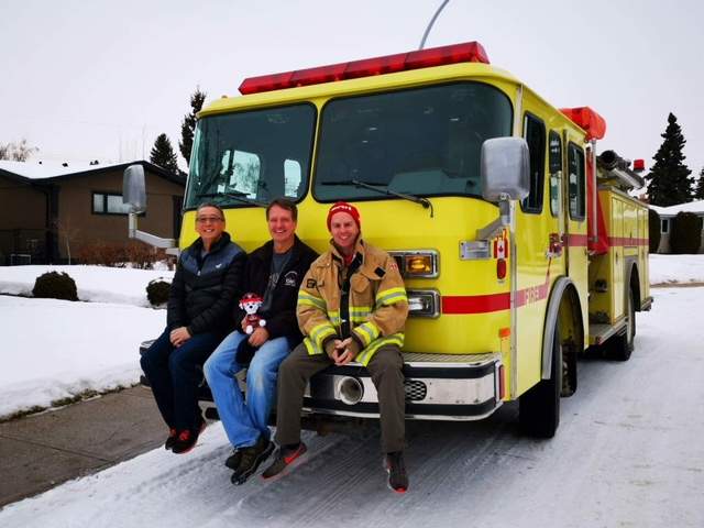 The trio in Edmonton right before they took off on the trip.
