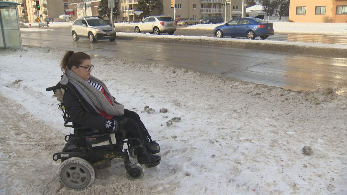 Kate Grisim sits by where she got stuck.