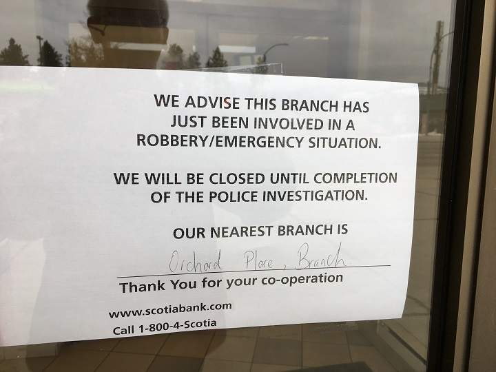 A note on the front door of the Scotiabank branch on Highway 33.