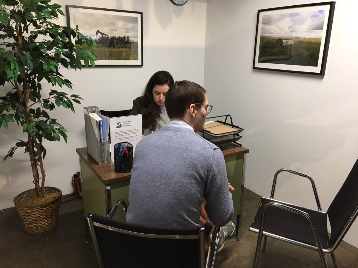 The adoption agency includes portraits of orphan wells along with information about remediation and the adoption process.
