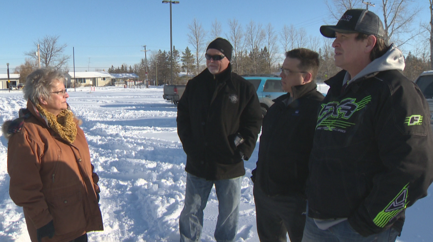 RM of St. Andrews mayor Joy Sul, left, talks to local residents in this file photo.