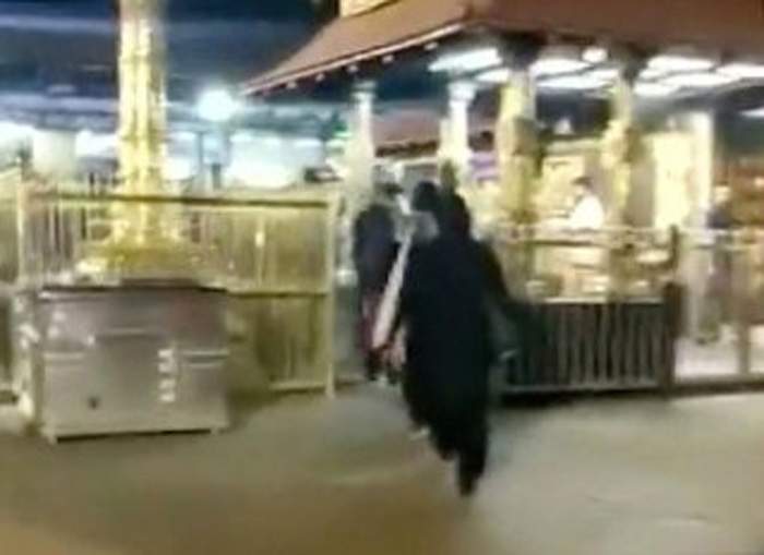 Two women enter the Sabarimala Temple in Pathanamthitta, Kerala, India, January 2, 2019.
