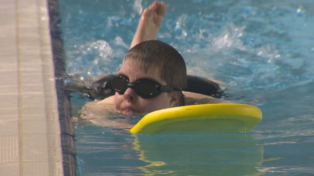Sara Daigle doing training laps in a local pool.