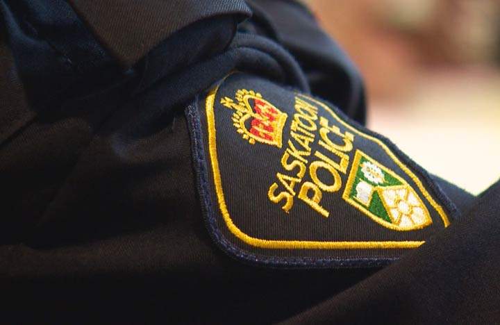 One suspect allegedly revealed a firearm and demanded their cellphones.