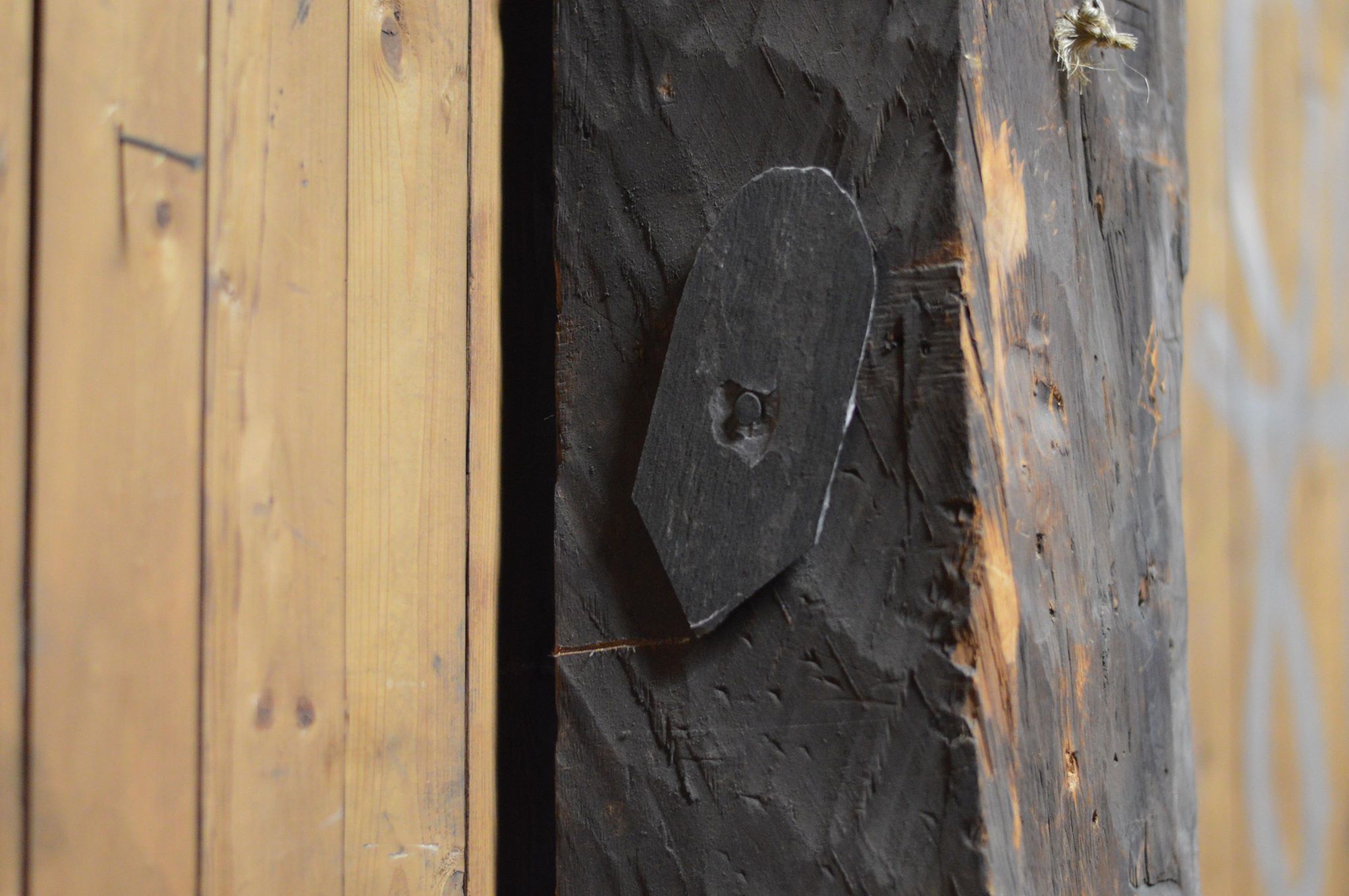A piece of slate tile that Peter Theriault discovered while giving a tour. He believes it may have been one of the old slate tiles that covered the roof.