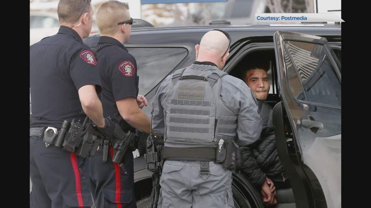 Matthew Macgugan was arrested and charged after a Calgary police car was stolen on Monday afternoon.