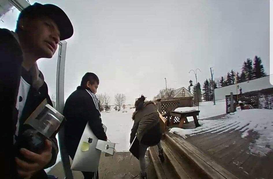 Images from surveillance video of suspects stealing items from a home near Thorsby, Alta., on Jan. 27, 2019.