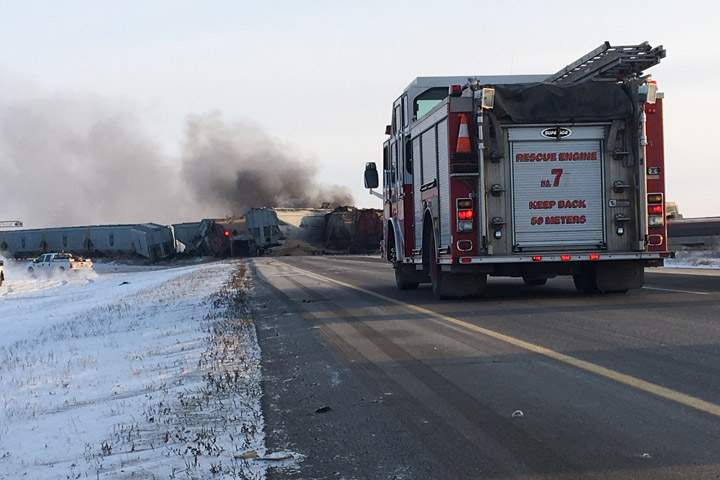 Freight cars block Highway 11 north of Saskatoon after a train derailment on Tuesday, Jan. 22, 2019.