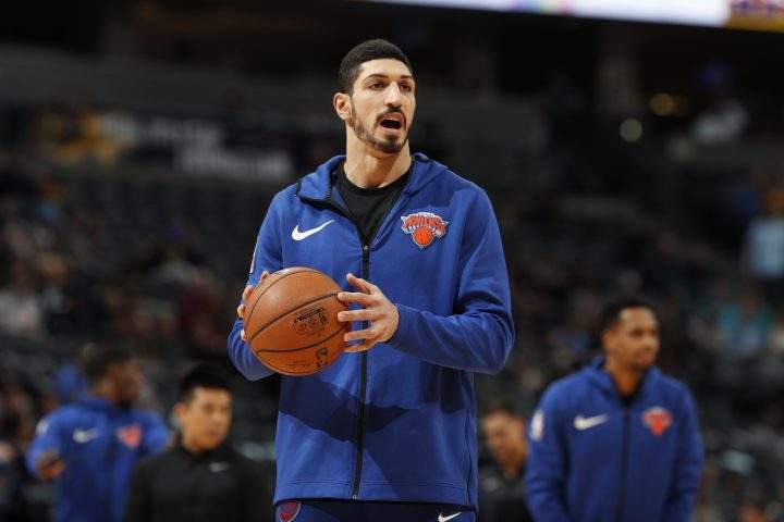 In this Jan. 1, 2019, file photo, New York Knicks centre Enes Kanter, of Turkey, warms up prior to the team’s NBA basketball game against the Denver Nuggets, in Denver.
